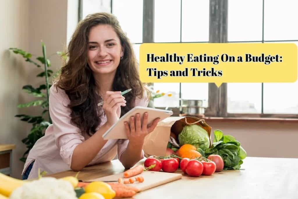 Colorful display of healthy, affordable foods including fruits, vegetables, and grains on a kitchen table for budget-friendly eating.