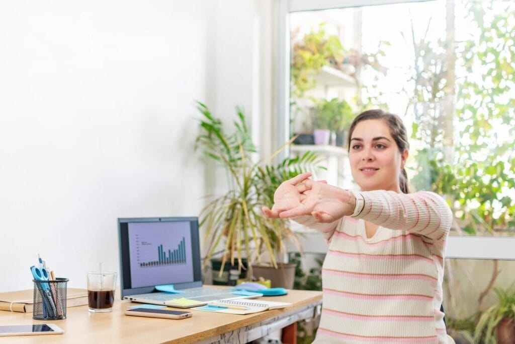 office-exercise-women-stretching-hands-shoulder